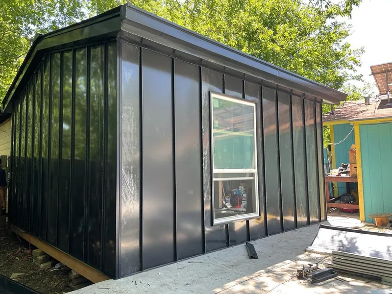 Black standing seam metal wall panels for Metal Roof Installation in Frisco