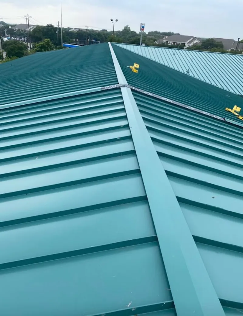 Green commercial metal roof ridge and valley for Metal Roof Repair in Frisco
